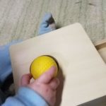 baby hand holding ball