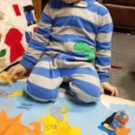 boy working with map of the world